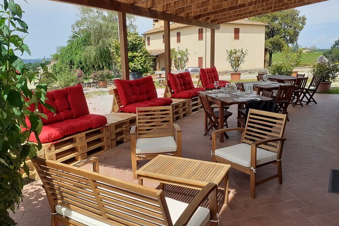 4 Wines Tasting with 2 Tuscan Cheeses & Tour at the winery - Entering a family-run Tuscan winery
