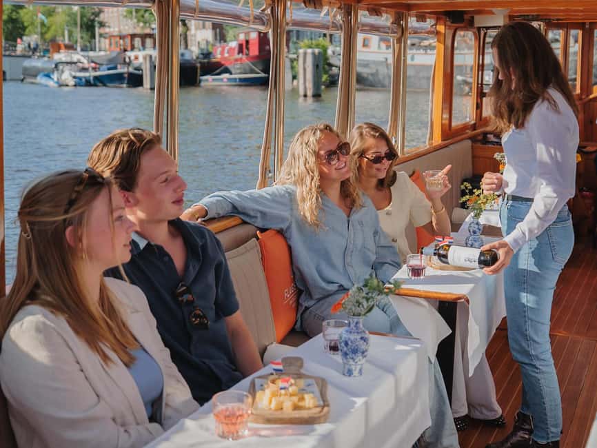 Amsterdam: Classic Saloon Boat Cruise with Cheese & Wine - Why this canal cruise feels more personal