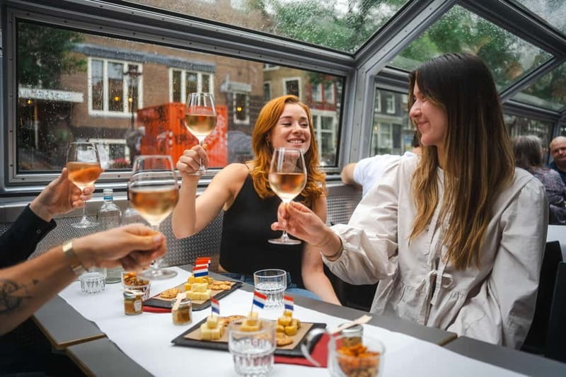 Amsterdam: Cozy Cheese & Wine Cruise Tasting Experience - A gentle start at Damrak Pier 5