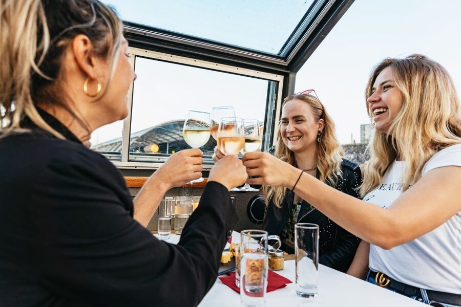 Amsterdam: Cozy Cheese & Wine Cruise Tasting Experience - The crew and the mood