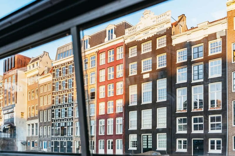 Amsterdam: Cozy Cheese & Wine Cruise Tasting Experience - Cheese, snacks, and drinks on board