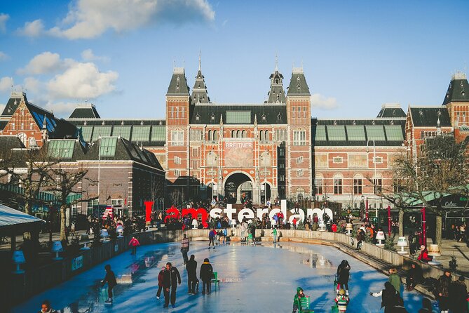 Amsterdam Day Trip from Brussels With Cheese, Clogs and Windmills - The red light district and Amsterdam’s varied character