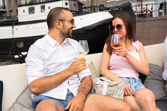 Amsterdam: Evening Candle Light Cruise With Wine & Cheese - The Seven Bridges view and the Magere Brug