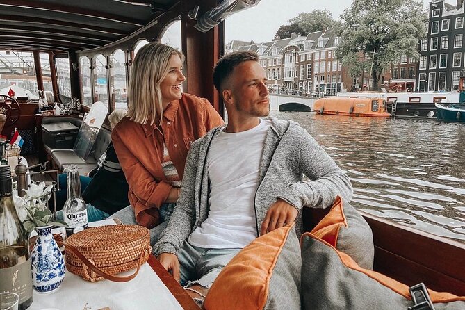 Amsterdam Small-Group Bike Tour With Canal Cruise, Drinks, Cheese - Starting near Nieuwezijds Voorburgwal