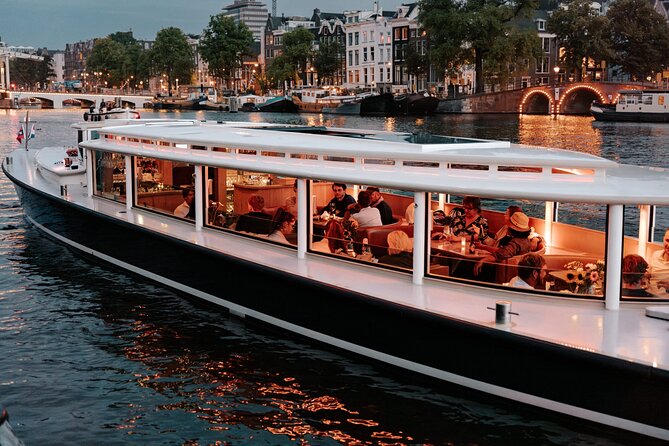 Amsterdam Small-Group Evening Canal Cruise Including Wine, Craft Beer, Cheese - Three drinks, cheese, and a relaxed pace