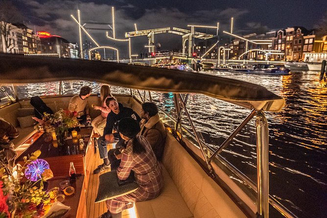 Amsterdam Small-Group Evening Canal Cruise Including Wine, Craft Beer, Cheese - The captain can shape the whole evening