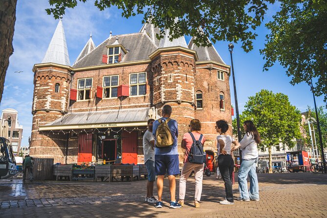 Amsterdam Walking Tour and Cruise with Drinks and Cheese Tasting - Begijnhof: a quiet garden behind the city center