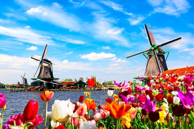 Amsterdam: Windmills, Cheese and Volendam Tour with Video Guide - Zaanse Schans and its working windmills