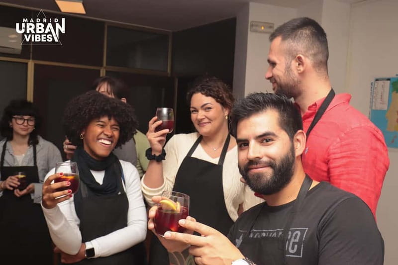Central Madrid: Sangría Workshop & Tasting with Local Cheese - Starting with a glass, a knife, and a little Spanish food lore