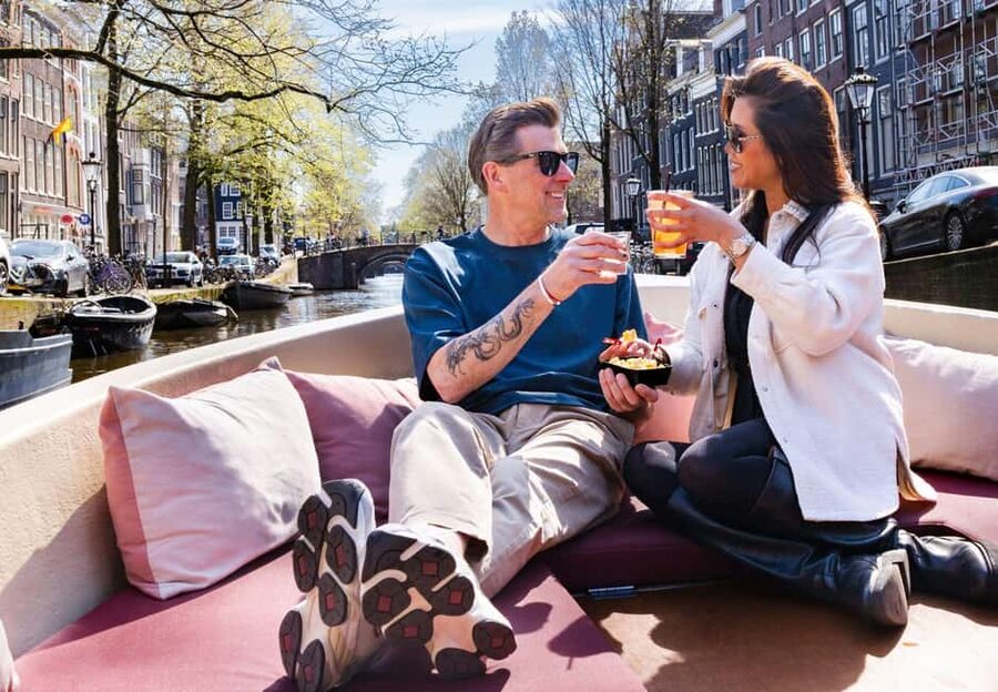 Cheese & Drinks Guided Amsterdam Boat Tour, All Inclusive - Passing the Oude Kerk and Amsterdam Centraal