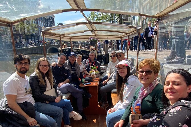 Dutch Cheese & Drinks Guided Amsterdam Boat Tour, All Inclusive - Munttoren and the story of Dutch coinage