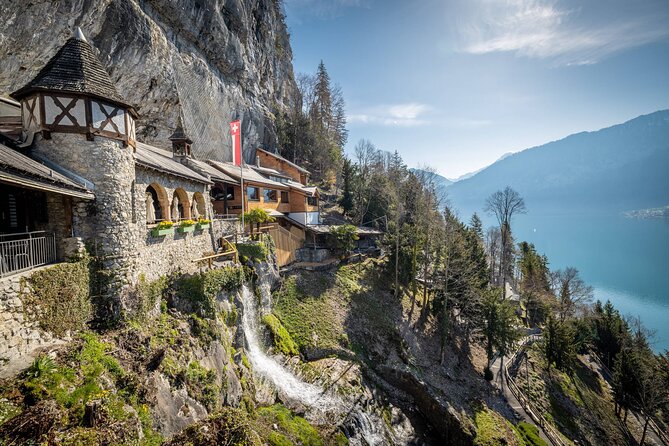 From Basel: Thun Tour, Beatus Caves, Lake Cruise & Cheese - St. Beatus Caves above the lake