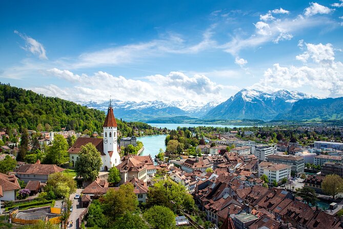 From Basel: Thun Tour, Beatus Caves, Lake Cruise & Cheese - Thun old town and castle views