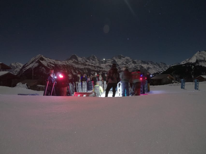 From Interlaken: Night Sledding with Cheese Fondue Dinner - Getting ready for an unlit sled track