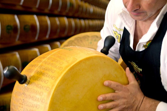Half Day Private Parmigiano Reggiano and Parma Ham Experience - A ten-minute look at Torrechiara Castle