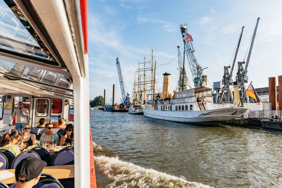 Hamburg: Harbor Cruise with Wine and Cheese - Sunset views, outdoor decks, and the heated salon