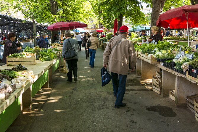 Paris Marché d’Aligre Walking Tour with Chocolate and Cheese Tasting - The flea market and the question of time