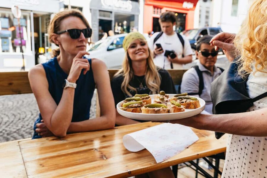 Paris: Montmartre Cheese, Wine & Pastry Guided Walking Tour - Cheese, charcuterie, baguette, and French wine