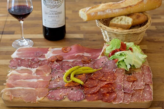 Paris St Germain Food Tour with Cheeses, Foie Gras, Wines & More - The savory route: cheese, meat, wine, and a secret dish