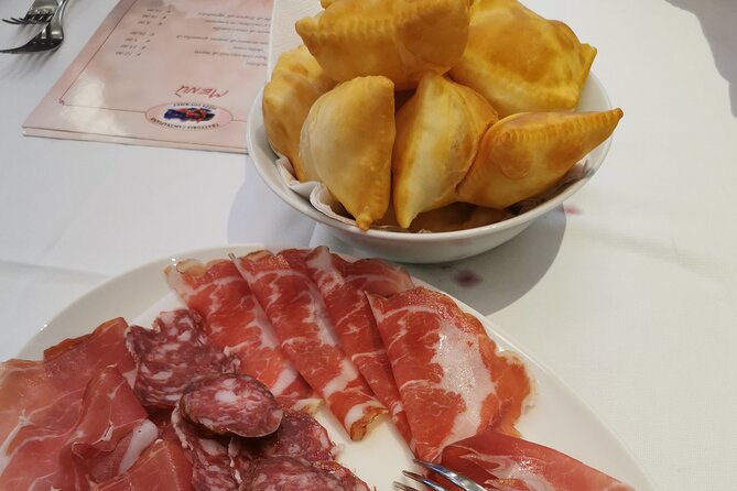 Parmigiano, Prosciutto and Traditional balsamic Tour from Bologna - Inside the prosciutto aging facility