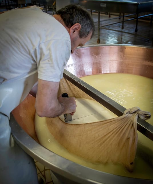Reggio Emilia: Parmigiano Reggiano & Balsamic Vinegar Tour - Entering the cheese caveau