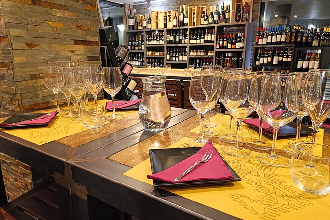 Taste of Lake Como: 4 Wines Paired with Local Cheese Charcuterie - Four Italian wines in a Como wine shop