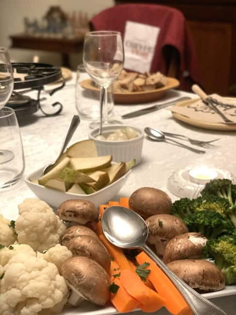 Traditional Swiss Dinner: Cheese Fondue, Appetizers/Dessert - The fondue: Gruyère, Emmental, wine, and garlic