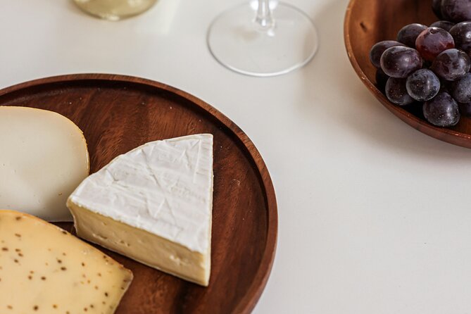 Wine & Cheese in Montmartre: A True Taste of France 6-ppl Max - Place Dalida, music, and views toward Sacré-Cœur