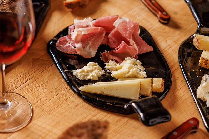 Wine Tasting Cold cuts and Rare Cheeses in Grotta a Testaccio - Group size, timing, and practical planning