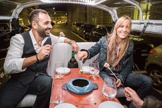 Zurich eTukTuk Private Tour - with Cheese Fondue and Wine - Bahnhofstrasse and Zurich’s polished face