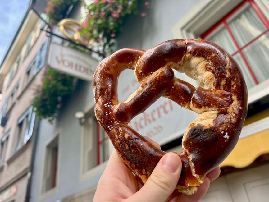 Zurich: Food Tour of 8+ Tastings with Cheeses & Chocolates - The cheese shop, Hay Schnaps, and Chäschüechli