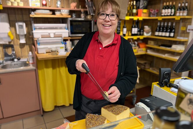 Zurich Food Tour with 10 Local Delicacies, Cheeses & Chocolates - Paradeplatz, chocolate, and the Swiss banking connection