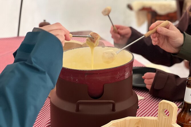 Zurich to Lucerne and Titlis Tour with Igloo Fondue Experience - Engelberg and the climb toward Titlis
